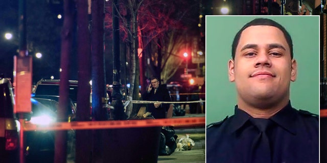 A general view shows the taped off area marking the scene of a shooting in Harlem, New York on January 22, 2022. - New York's mayor called on the federal government to help "stop the flow of weapons" in the city after a police officer was killed and another wounded in a shooting. 