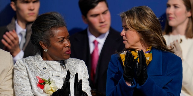 Virginia Lt. Gov. Winsome Sears, left, speaks with Virginia first lady Suzanne Youngkin during an inauguration ceremony, Saturday, Jan. 15, 2022, in Richmond, Va.