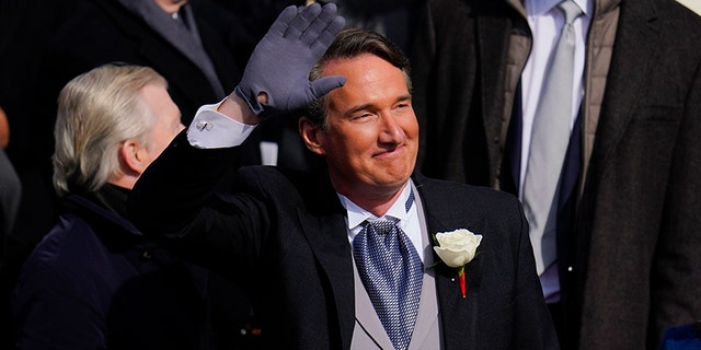 Gov. elect Glenn Youngkin waves to the crowd before his inauguration ceremony, Saturday, Jan. 15, 2022, in Richmond, Virginia.