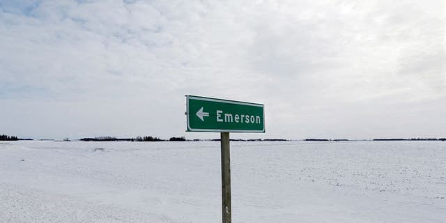 A sign post for the small border town of Emerson, near the Canada-U.S border crossing in Emerson, Manitoba, Canada, February 1, 2017. REUTERS/Lyle Stafford//File Photo