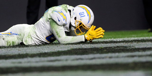 Los Angeles Chargers wide receiver Mike Williams (81) reacts after missing an attempt at touchdown catch against the Las Vegas Raiders during overtime of an NFL football game on Sunday, January 9, 2022 in Las Vegas. 