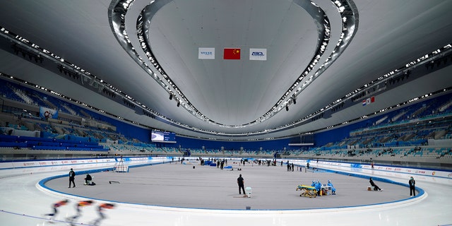 Skaters compete during the Speed Skating China Open, a test event for the 2022 Winter Olympics, at the National Speed Skating Oval in Beijing, Saturday, Oct. 9, 2021.