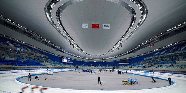Skaters compete during the Speed Skating China Open, a test event for the 2022 Winter Olympics, at the National Speed Skating Oval in Beijing, Saturday, Oct. 9, 2021.