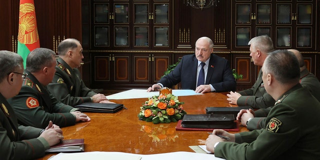 Belarusian President Alexander Lukashenko attends a meeting with military top officials in Minsk, Belarus, Monday, Jan.17, 2022. 