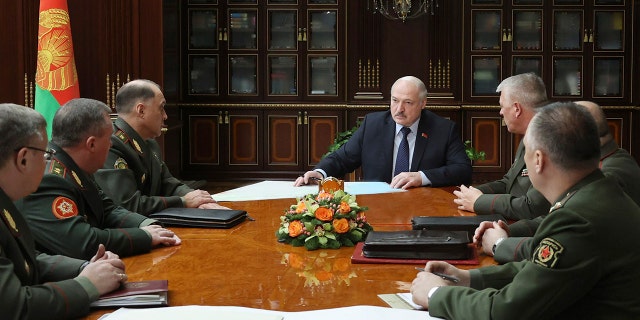 Belarusian President Alexander Lukashenko attends a meeting with military top officials in Minsk, Belarus, Monday, Jan.17, 2022.