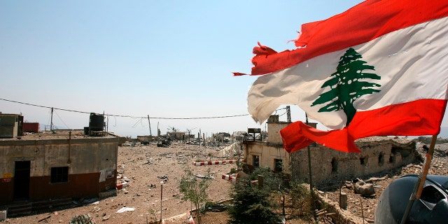 A Lebanese flag flies over Khiam prison, on Aug. 16, 2006, in the southern town of Khiam, Lebanon.