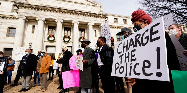Protesters demonstrate calling for police accountability in the death of 8-year-old Fanta Bility who was shot outside a football game, at the Delaware County Courthouse in Media, Pa., Thursday, Jan. 13, 2022.