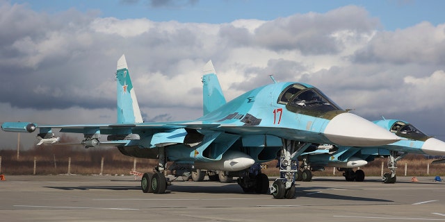 Russian Su-34 bombers parked to take part in a training mission in Krasnodar Region, Russia, Wednesday, Jan. 19, 2022