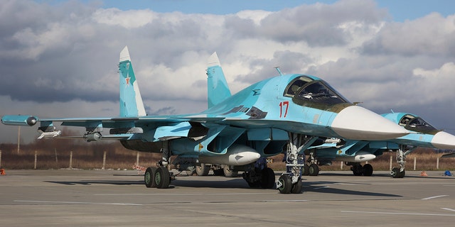 Russian Su-34 bombers parked to take part in a training mission in Krasnodar Region, Russia, Wednesday, Jan. 19, 2022