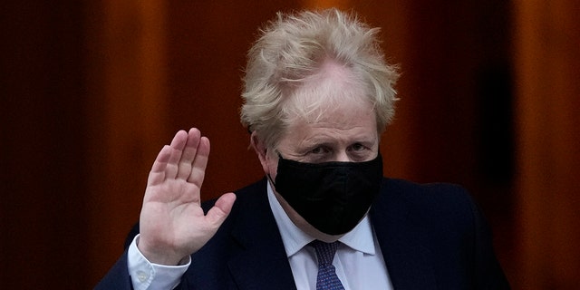 Britain's Prime Minister Boris Johnson leaves 10 Downing Street to attend the weekly Prime Ministers' Questions session in parliament in London, Jan. 5, 2022.