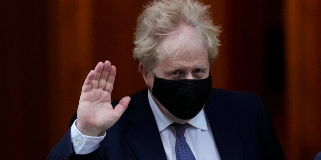Britain's Prime Minister Boris Johnson leaves 10 Downing Street to attend the weekly Prime Ministers' Questions session in parliament in London, Jan. 5, 2022.