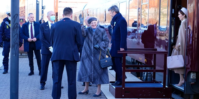 Queen Margrethe, Crown Prince Frederik and Crown Princes Mary arrives at Roskilde train station on their way to Roskilde Cathedral on the day of Queen Margrethe 50th Regent's Anniversary at Christiansborg Castle, Copenhagen, Friday Jan. 14, 2022.