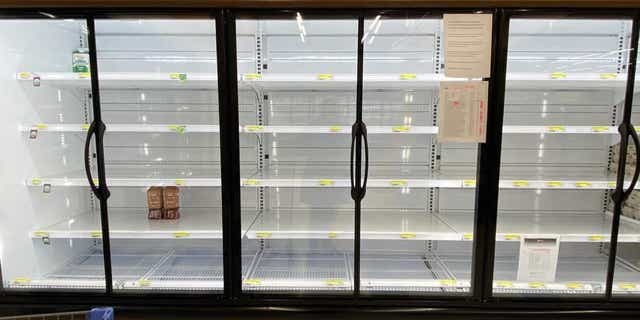 Empty commissary shelves at Yokota Air Base, Japan.