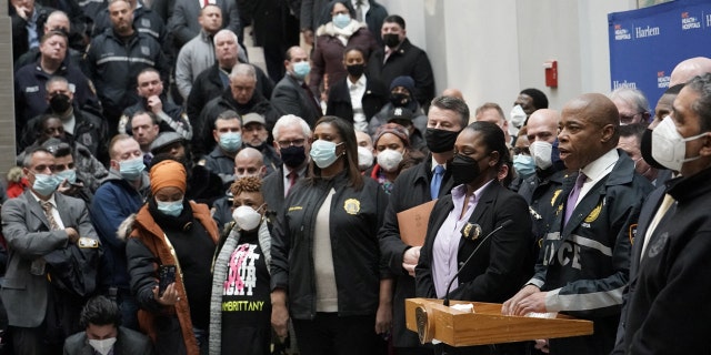 New York City Mayor Eric Adams speaks addresses the press about the scene where NYPD officers were shot while responding to a domestic violence call in the Harlem neighborhood of New York City, Jan. 21, 2022.