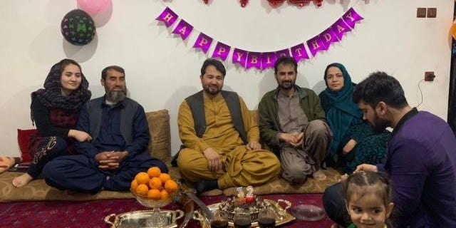 Afghan family celebrates a birthday. Courtesy of Abdullah Rahmatzada