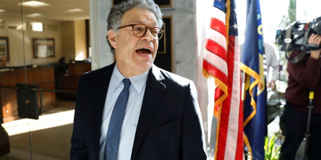 U.S. Senator Al Franken talks to the media outside his office on Capitol Hill in Washington, U.S., November 27, 2017. REUTERS/Yuri Gripas