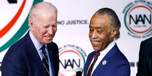 MSNBC host and Harlem, N.Y.-based activist Al Sharpton, right, introduces President Joe Biden in North Charleston, S.C. 