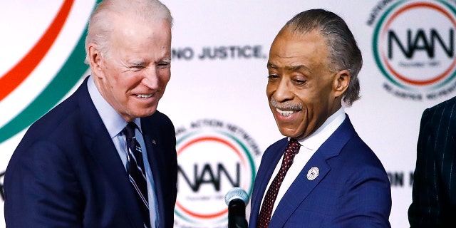 MSNBC host and Harlem, N.Y.-based activist Al Sharpton, right, introduces President Joe Biden in North Charleston, S.C. 