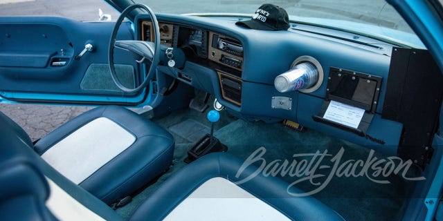 The Wayne's World Pacer has a cup dispenser in the dashboard.