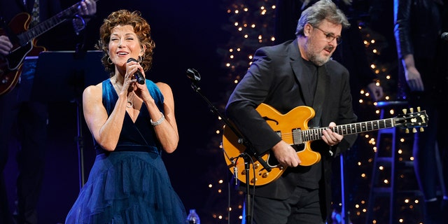 Amy Grant and Vince Gill perform at the Ryman Auditorium on December 13, 2021 in Nashville, Tennessee. 