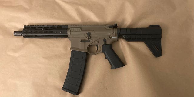 The NYPD found this loaded AR-15 under Lashawn McNeil's mattress the day after he allegedly shot two officers, leaving one dead and the other critically wounded. 