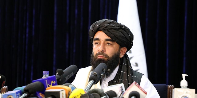 Taliban spokesperson Zabihullah Mujahid answers press members questions as he holds a press conference in Kabul, Afghanistan on August 17, 2021. 