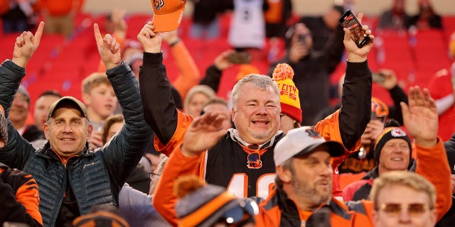 Fans celebrate following the Cincinnati Bengals overtime win against the Kansas City Chiefs in the AFC Championship Game at Arrowhead Stadium. (Photo by David Eulitt/Getty Images)