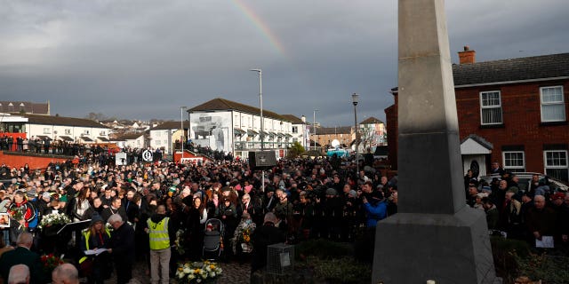 People take part in a march to commemorate the 50th anniversary of the Bloody Sunday shootings in Londonderry, Sunday, Jan. 30, 2022. In 1972, British soldiers shot 28 unarmed civilians at a civil rights march, killing 13 on what is known as Bloody Sunday or the Bogside Massacre. Sunday marks the 50th anniversary of the shootings in the Bogside area of Londonderry.