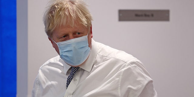 Britain's Prime Minister Boris Johnson visits the Milton Keynes University Hospital, on January 24, 2022 in Milton Keynes, England. (Photo by Adrian Dennis - WPA Pool/Getty Images)