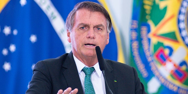 Brazilian President Jair Bolsonaro speaks during a news conference in Brasília in December 2021.