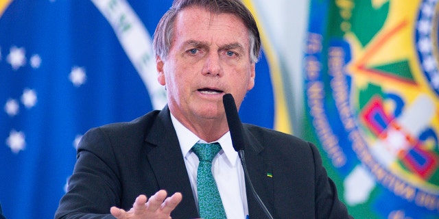 Brazilian President Jair Bolsonaro speaks during a news conference in Brasília in December 2021.