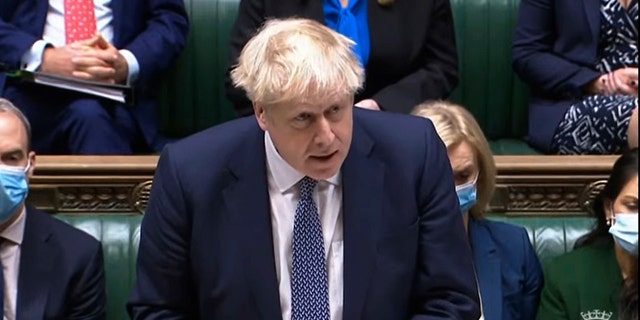 Prime Minister Boris Johnson makes a statement ahead of Prime Minister's Questions in the House of Commons, London, Wednesday, Jan. 12, 2022.
