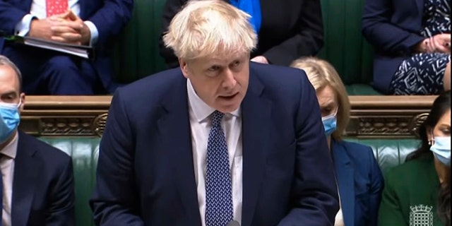 Prime Minister Boris Johnson makes a statement ahead of Prime Minister's Questions in the House of Commons, London, Wednesday, Jan. 12, 2022.