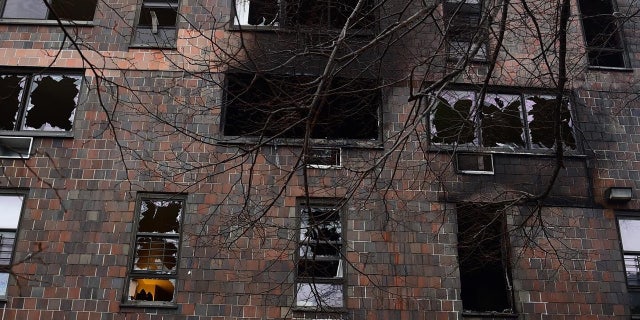 A view of the apartment building after a deadly fire in the Bronx, on January 9, 2022, in New York. (Photo by New York City Fire Department/Anadolu Agency via Getty Images)