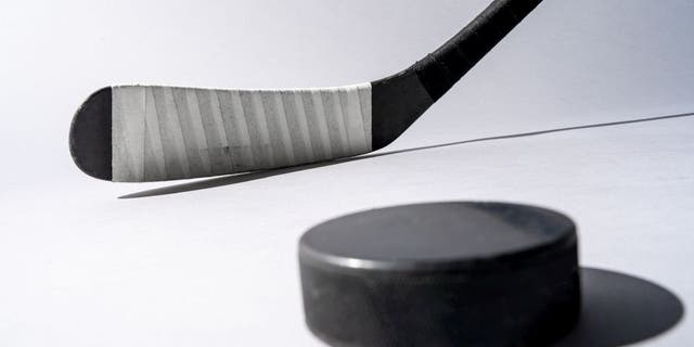 Hockey pucks are made from vulcanized rubber, which is the material that make it rigid, durable and smooth.