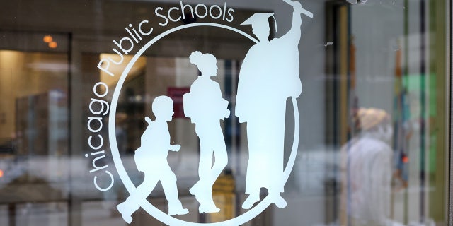 A sign is displayed on the front of the headquarters for Chicago Public Schools on January 05, 2022 in Chicago, Illinois.  (Photo by Scott Olson/Getty Images)