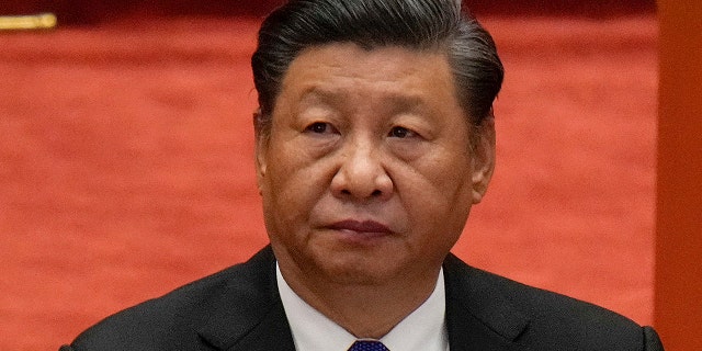 Chinese President Xi Jinping attends an event commemorating the 110th anniversary of the Xinhai Revolution at the Great Hall of the People in Beijing on October 9, 2021.