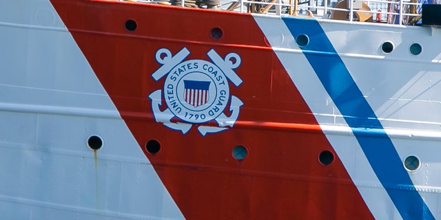 The logo of the United States Coast Guard on the hull of the American sailing training ship Eagle