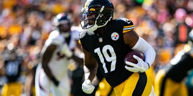Pittsburgh Steelers wide receiver JuJu Smith-Schuster (19) runs with the ball during a game against the Denver Broncos Oct. 10, 2021, at Heinz Field in Pittsburgh.