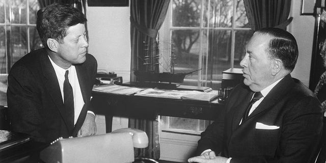 Chicago mayor Richard Daley and President John F. Kennedy discuss the need for a department of urban affairs in the White House (Getty Images)