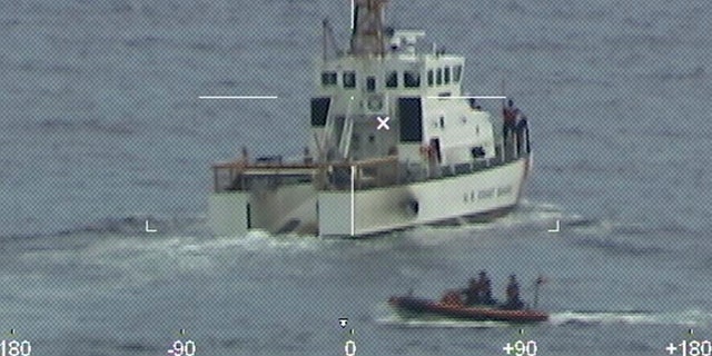 Coast Guard Cutter Ibis' crew searching for people missing from a capsized boat off the coast of Florida, Tuesday, Jan. 25, 2022. 