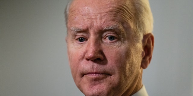 President Biden speaks after exiting a meeting with the Senate Democratic Caucus in Washington, on Thursday, Jan. 13, 2022. 