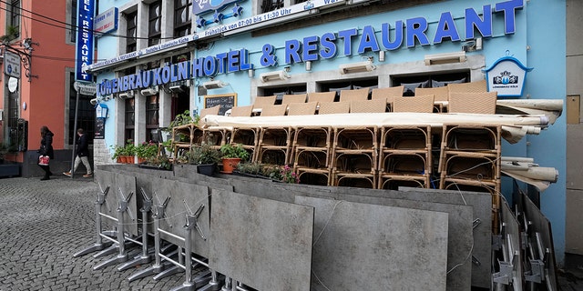 A closed hotel and restaurant is pictured in Cologne, Germany, Friday, Jan. 7, 2022. New corona measures are expected from a meeting of German governors and the federal government today to fight the COVID-19 pandemic. 