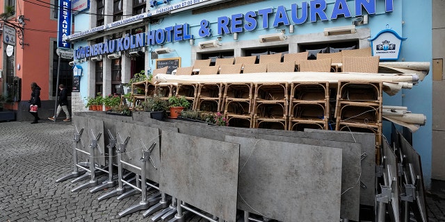 A closed hotel and restaurant is pictured in Cologne, Germany, Friday, Jan. 7, 2022. New corona measures are expected from a meeting of German governors and the federal government today to fight the COVID-19 pandemic.