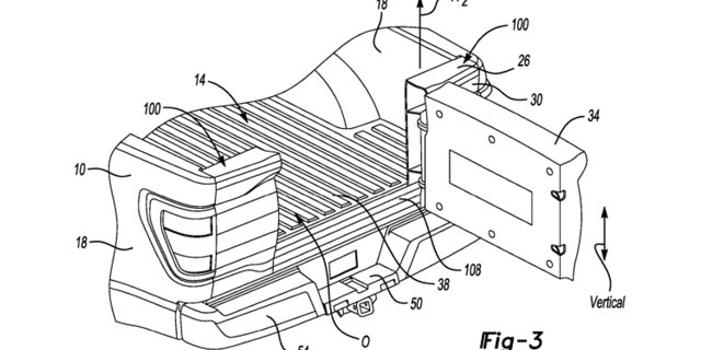 The door is centered in the tailgate, which can also be folded down to open.