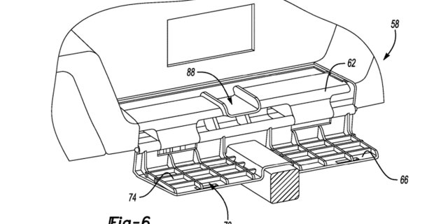 A small, fold-down bumper step can be used in conjunction with the side-hinged door.