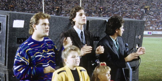 Dave Coulier, Bob Saget, John Stamos, Candace Cameron Bure and Jodi Sweetin jam out to The Beach Boys performing during an episode of "Full House" that aired on November 18, 1988.