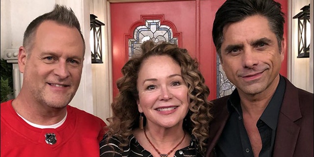 Gail Edwards poses for a photo alongside co-stars Dave Coulier (left) and John Stamos (right) while filming the ‘Fuller House’ finale.