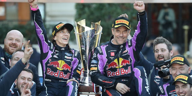 Isabelle Galmiche and Sebastien Loeb celebrated their victory at the Monte Carlo Rally.