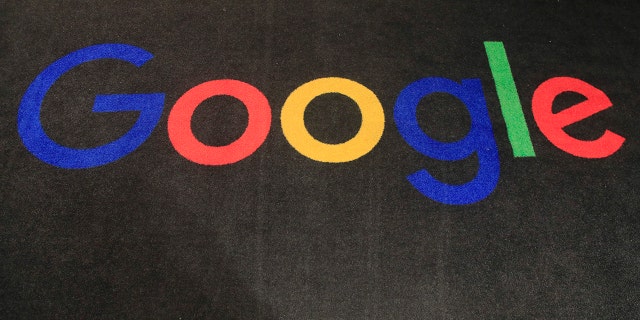 The logo of Google is displayed on a carpet at the entrance hall of Google France in Paris, Nov. 18, 2019.